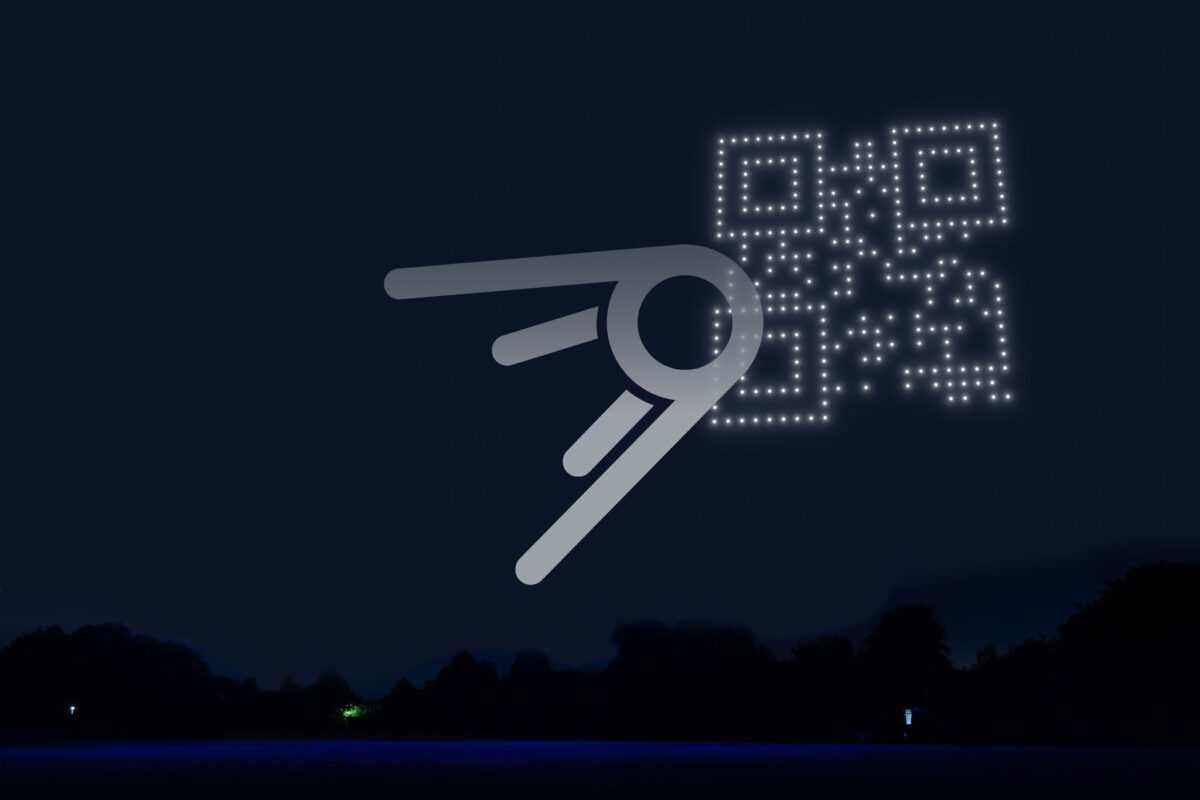 LED-Drohnen bilden eine digitale Form oder ein interaktives Symbol am Himmel.
