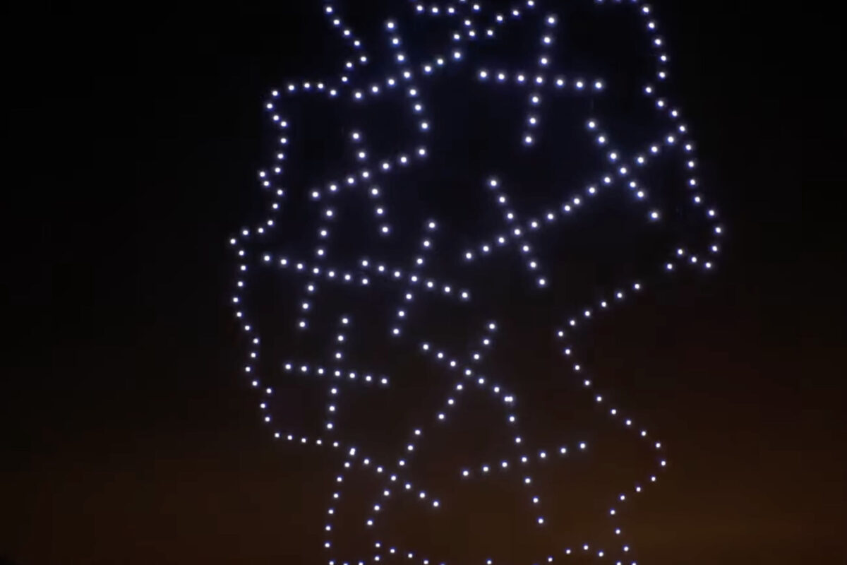 Drohnen formen ein Symbol für Geschwindigkeit und Vernetzung.