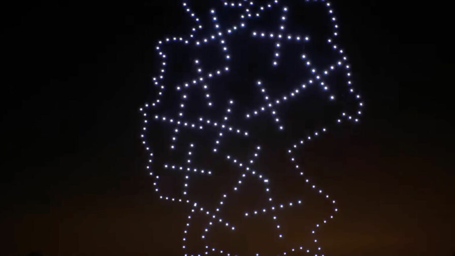 Drohnen formen ein Symbol für Geschwindigkeit und Vernetzung.