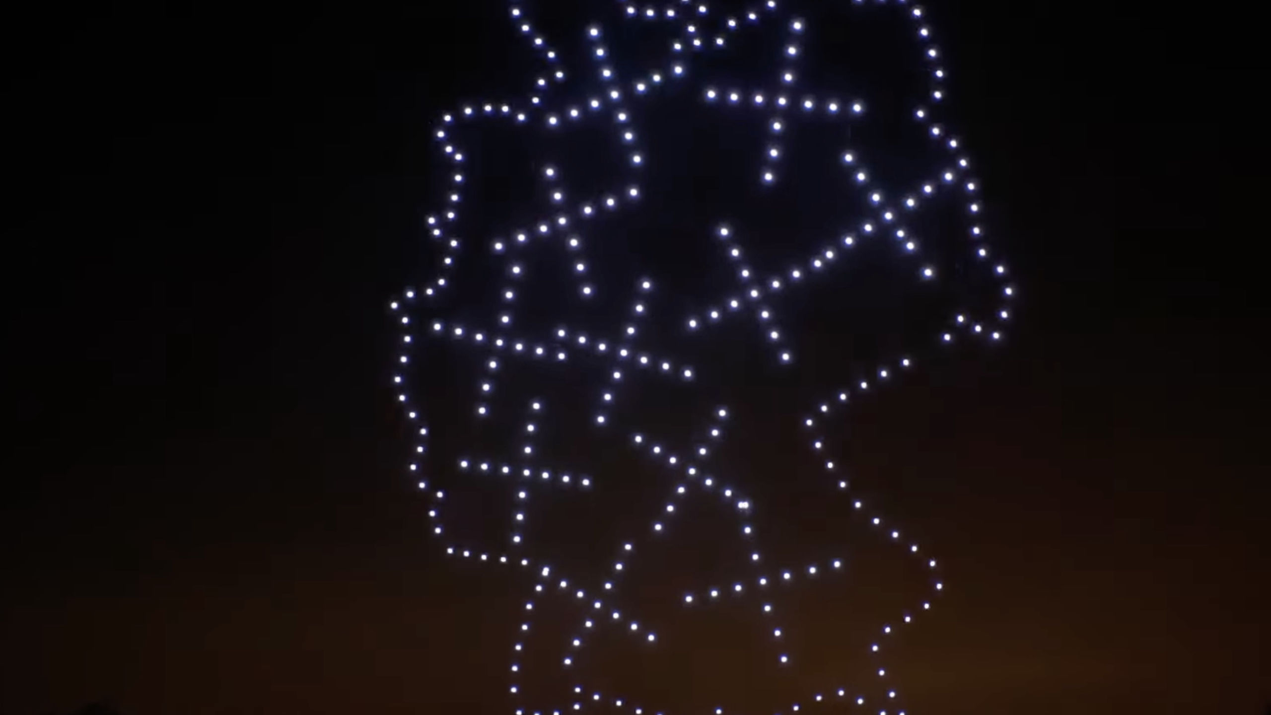 Drohnen formen ein Symbol für Geschwindigkeit und Vernetzung.