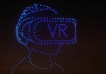 Drohnenformation symbolisiert digitale Vernetzung und Geschwindigkeit.